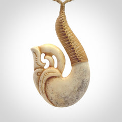 This is a wonderful pendant carved from Deer Antler. Hand made by Anthony Bray-Heta. Order yours now on NZ Pacific at www.nzpacific.com