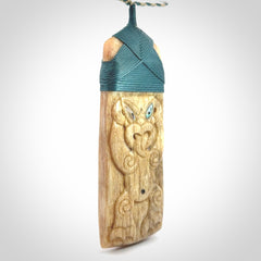 This is a wonderful, large Toki with Tiki from Bone