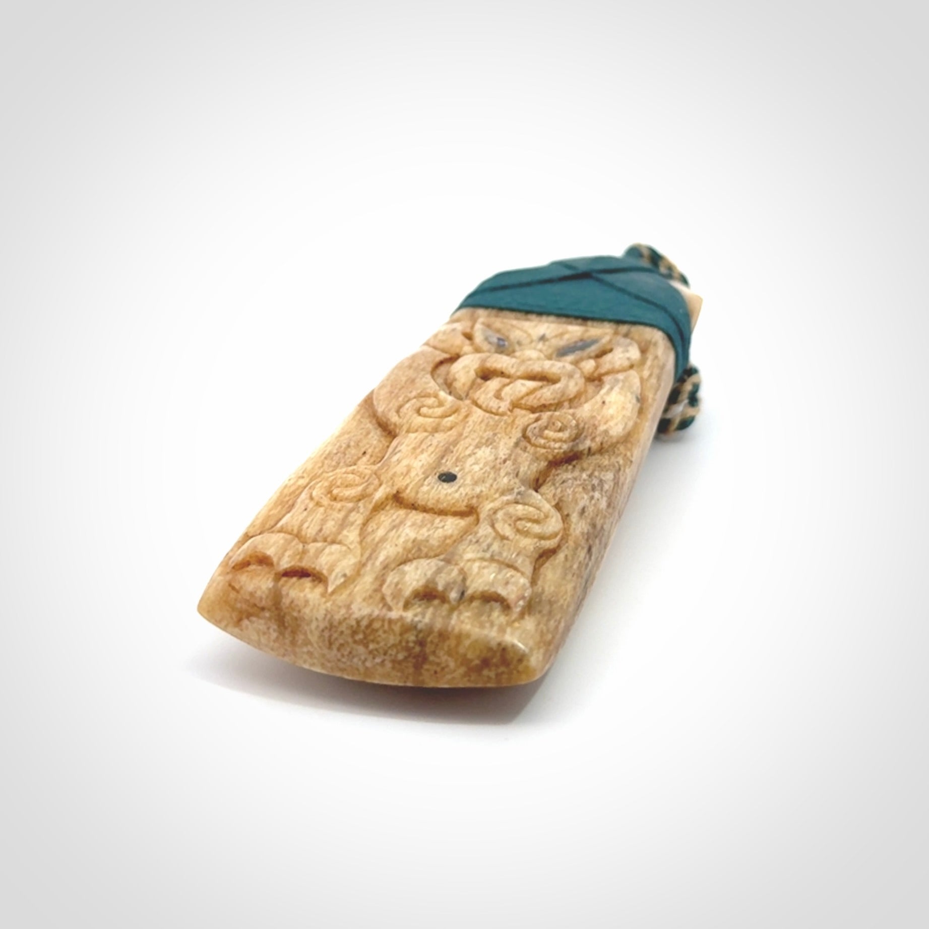 This is a wonderful, large Toki with Tiki from Bone
