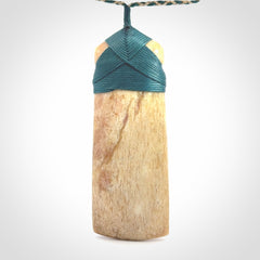 This is a wonderful, large Toki with Tiki from Bone