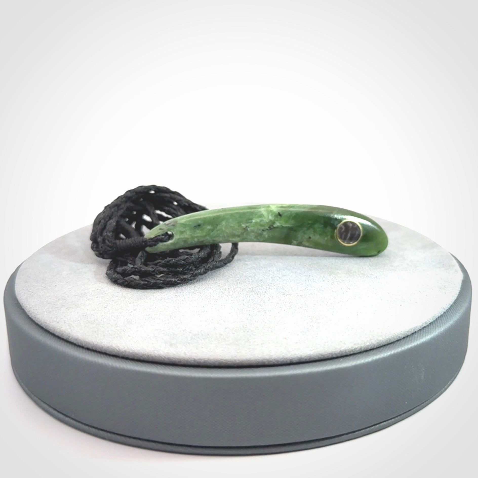 This is a wonderful New Zealand Jade drop pendant with black mother of pearl and brass inlay.