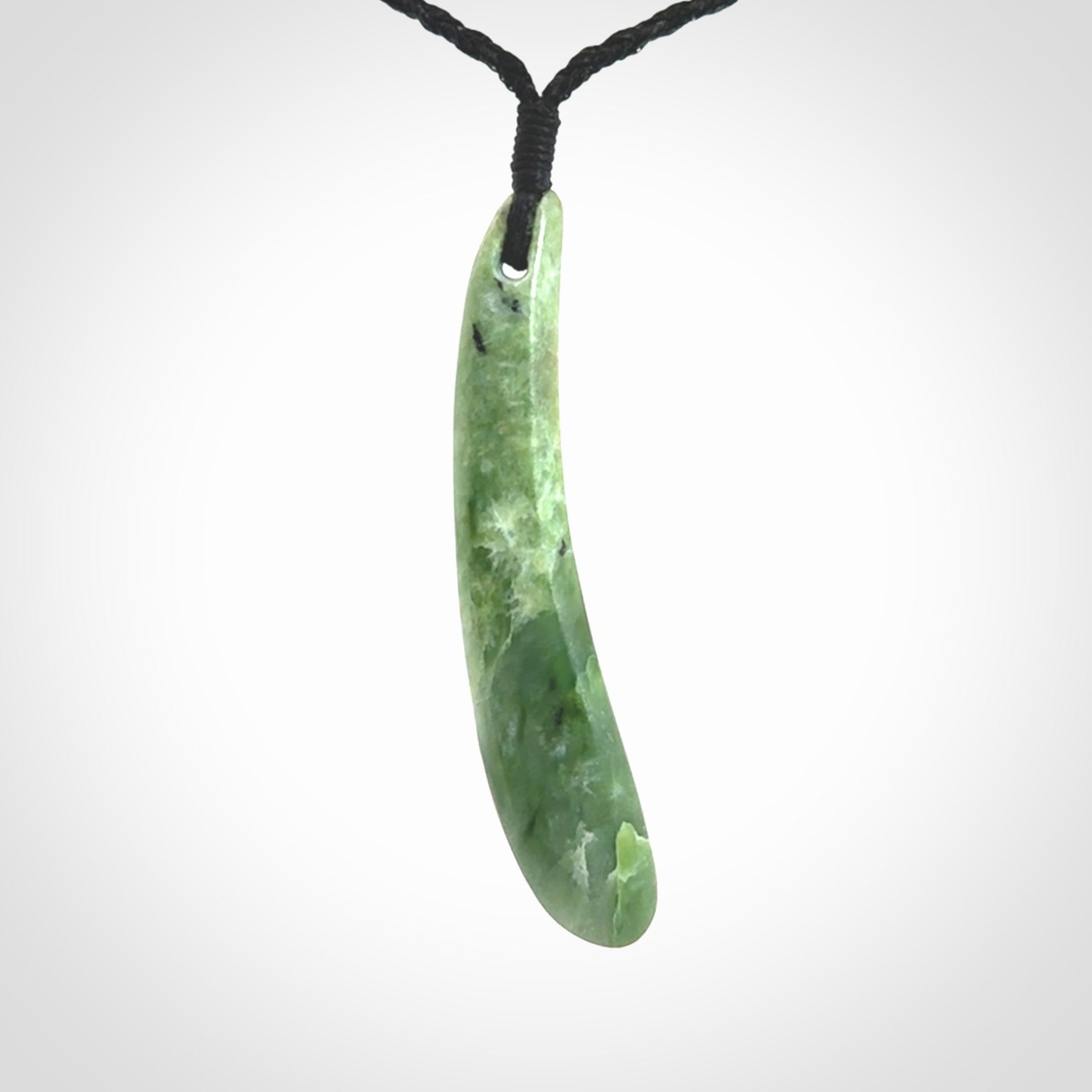 This is a wonderful New Zealand Jade drop pendant with black mother of pearl and brass inlay.