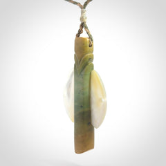 This is a wonderful New Zealand Jade and Mother of Pearl drop pendant.