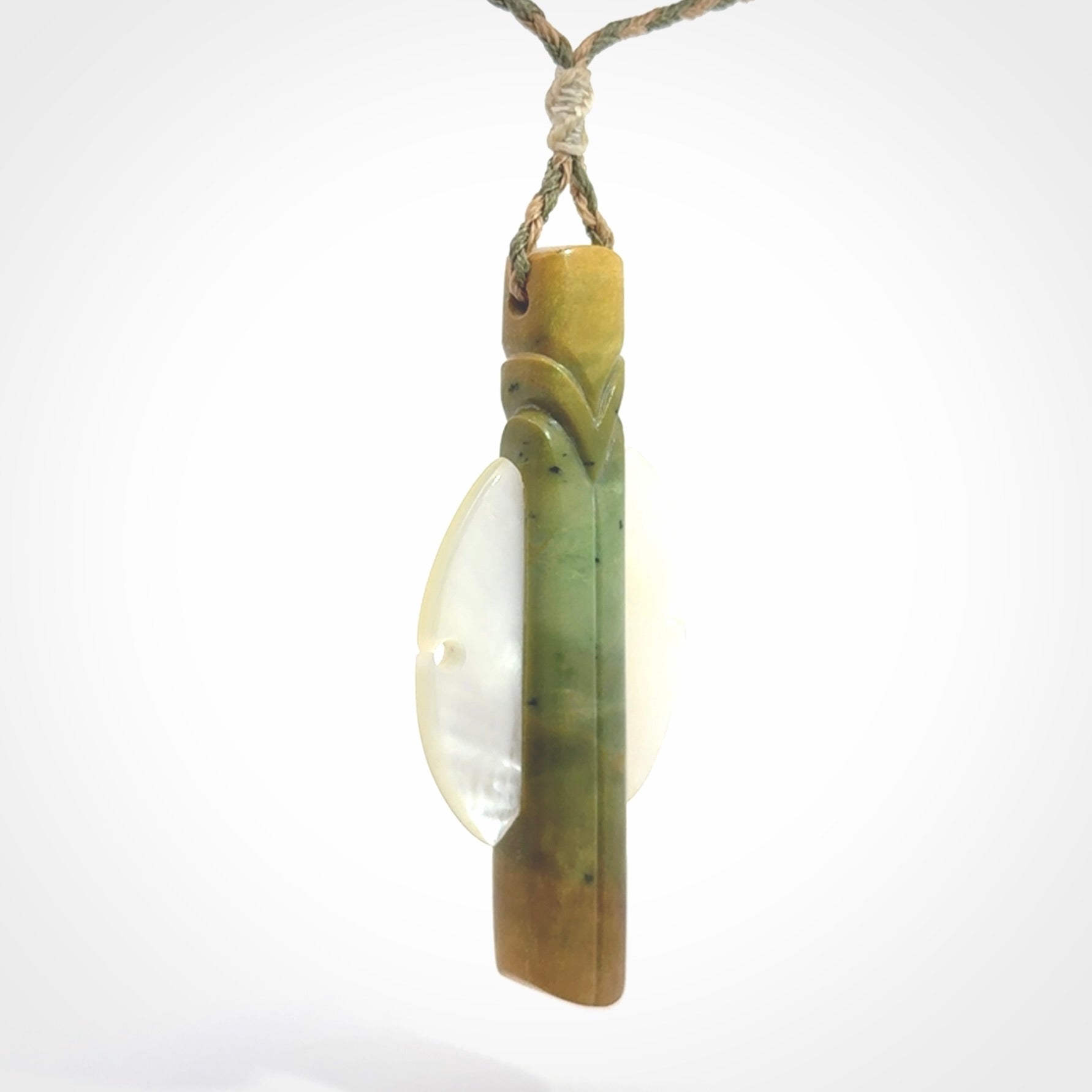 This is a wonderful New Zealand Jade and Mother of Pearl drop pendant.
