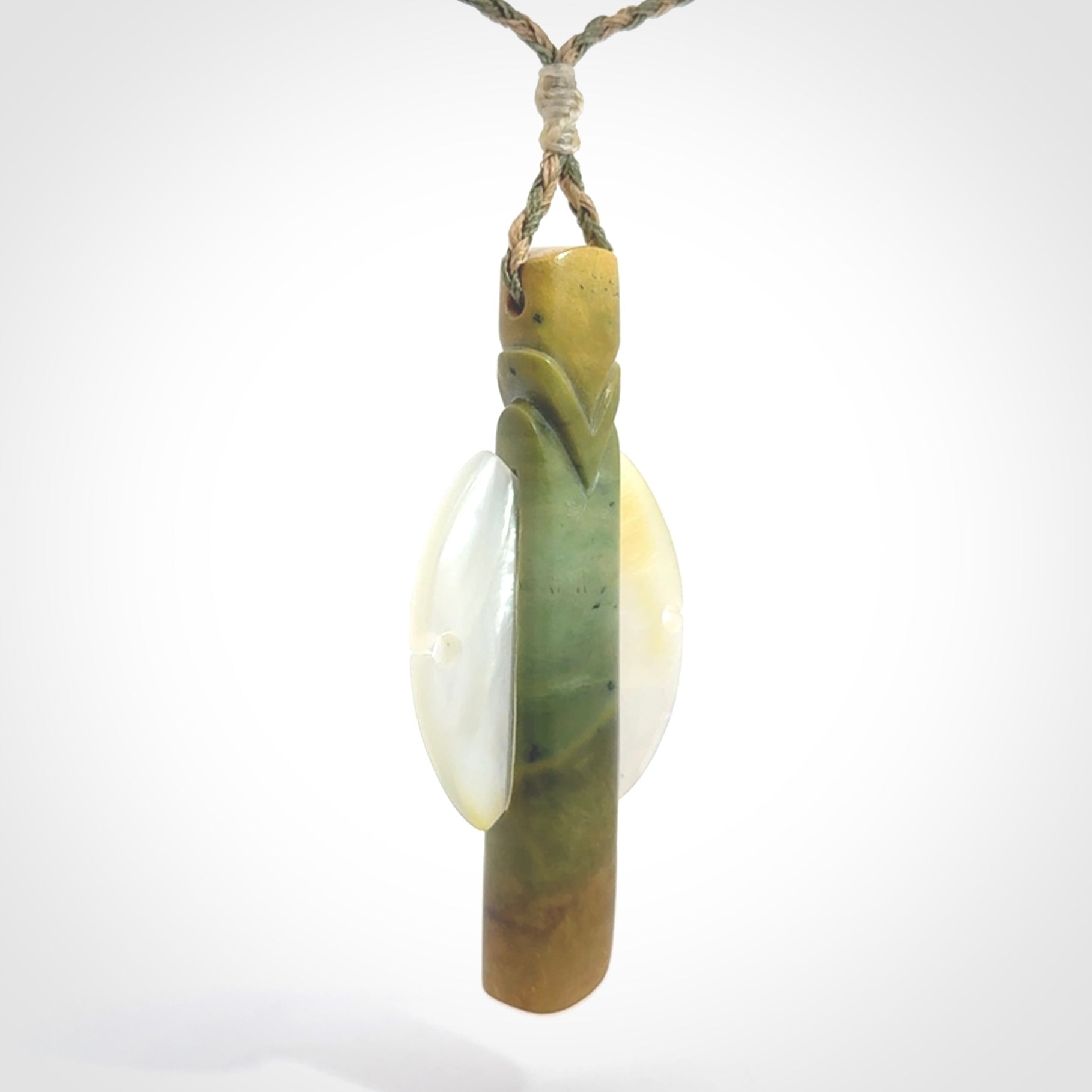 This is a wonderful New Zealand Jade and Mother of Pearl drop pendant.