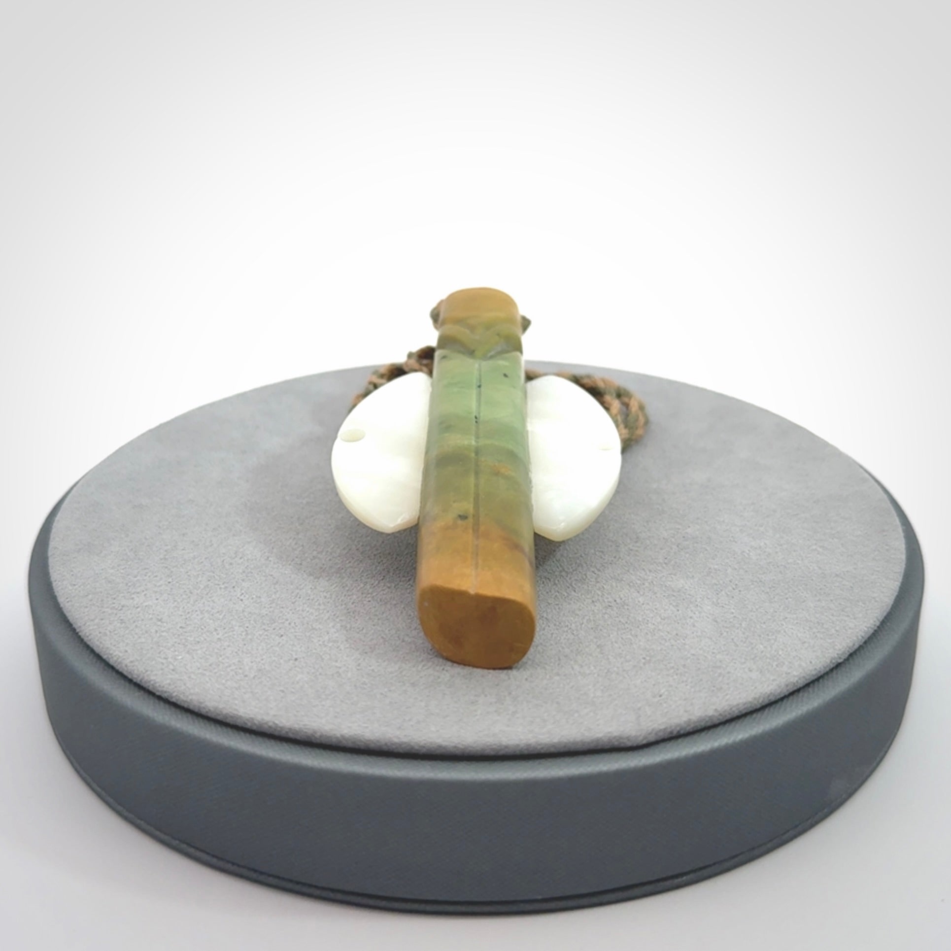 This is a wonderful New Zealand Jade and Mother of Pearl drop pendant.