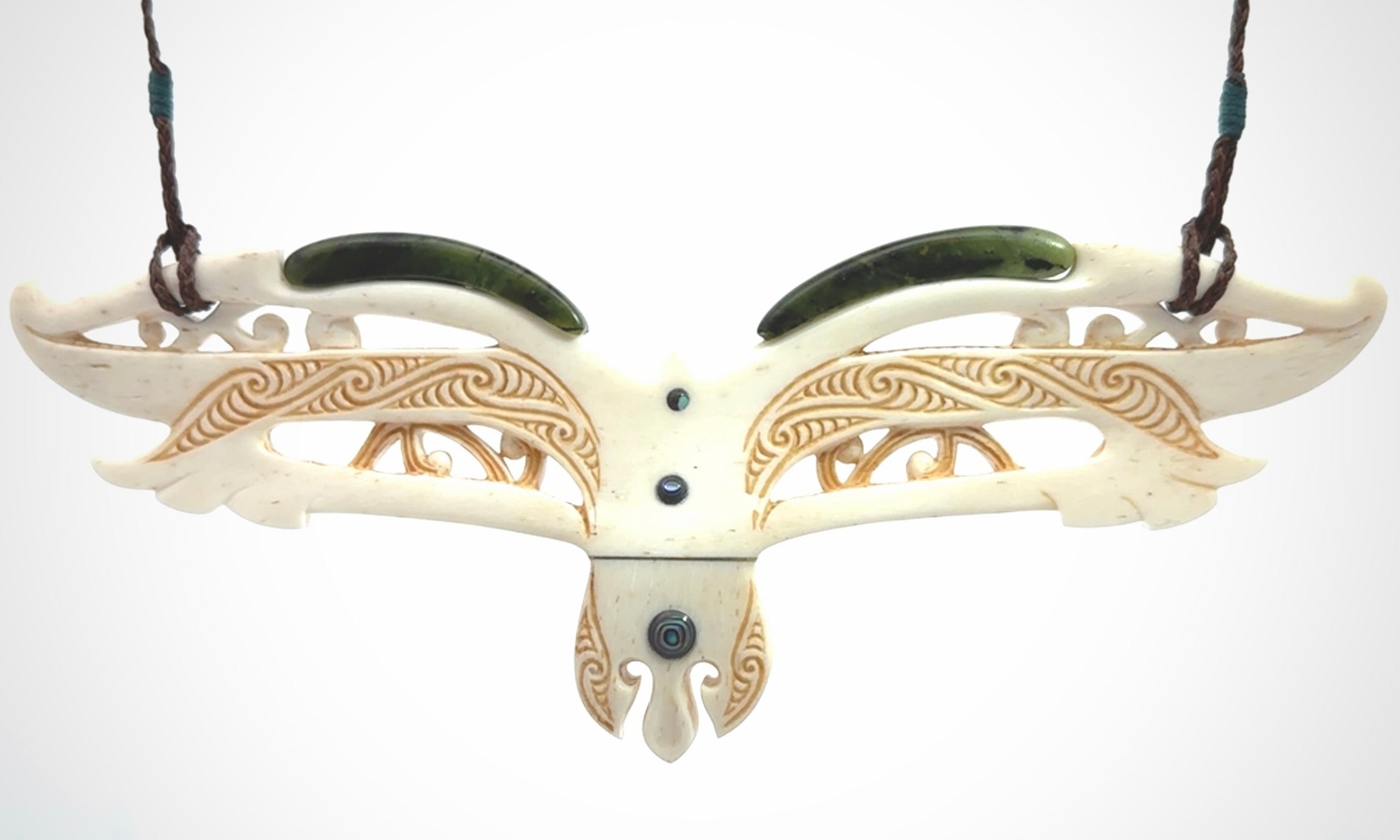 This is a wonderful New Zealand Jade and Bone necklace that can also be displayed as a sculpture with wooden stand.