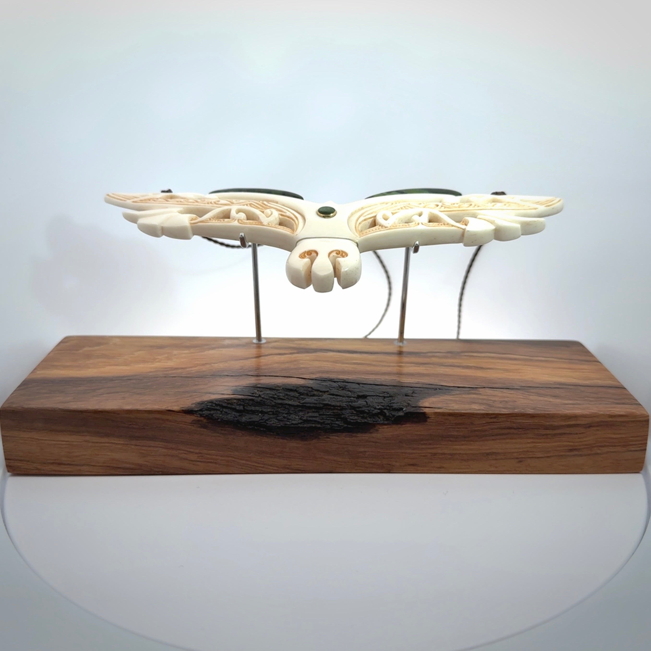 This is a wonderful New Zealand Jade and Bone necklace that can also be displayed as a sculpture with wooden stand.