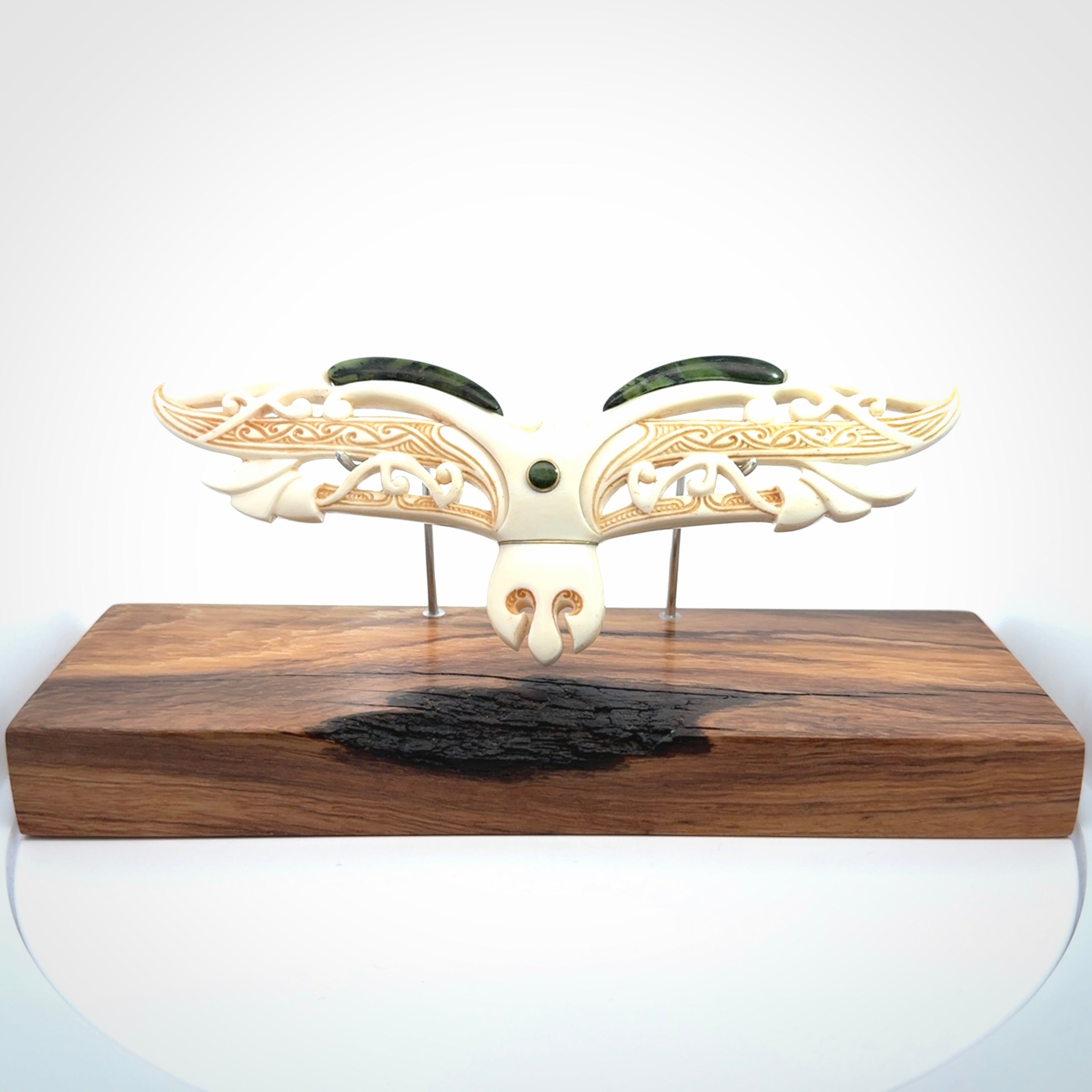 This is a wonderful New Zealand Jade and Bone necklace that can also be displayed as a sculpture with wooden stand.