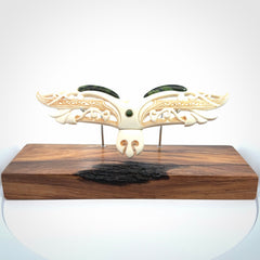 This is a wonderful New Zealand Jade and Bone necklace that can also be displayed as a sculpture with wooden stand.