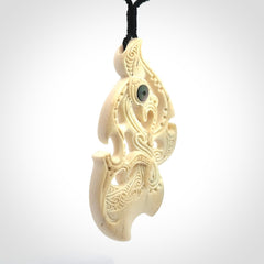 This is a wonderful, finely carved Manaia pendant. It is hand carved by Andrew Doughty and we will ship it to you free anywhere in the world. Hand made from whale bone and delivered to you with an adjustable black cord. Packaged in a woven kete pouch.