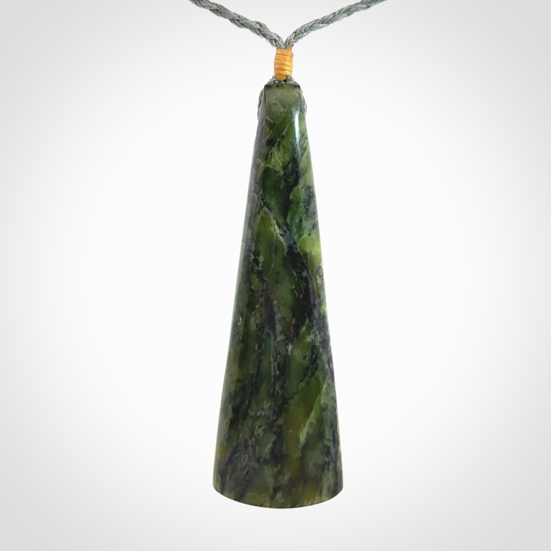 A Striking Jade Drop Pendant with Mother of Pearl and Brass inlay