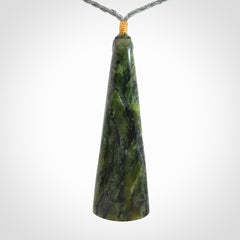 A Striking Jade Drop Pendant with Mother of Pearl and Brass inlay