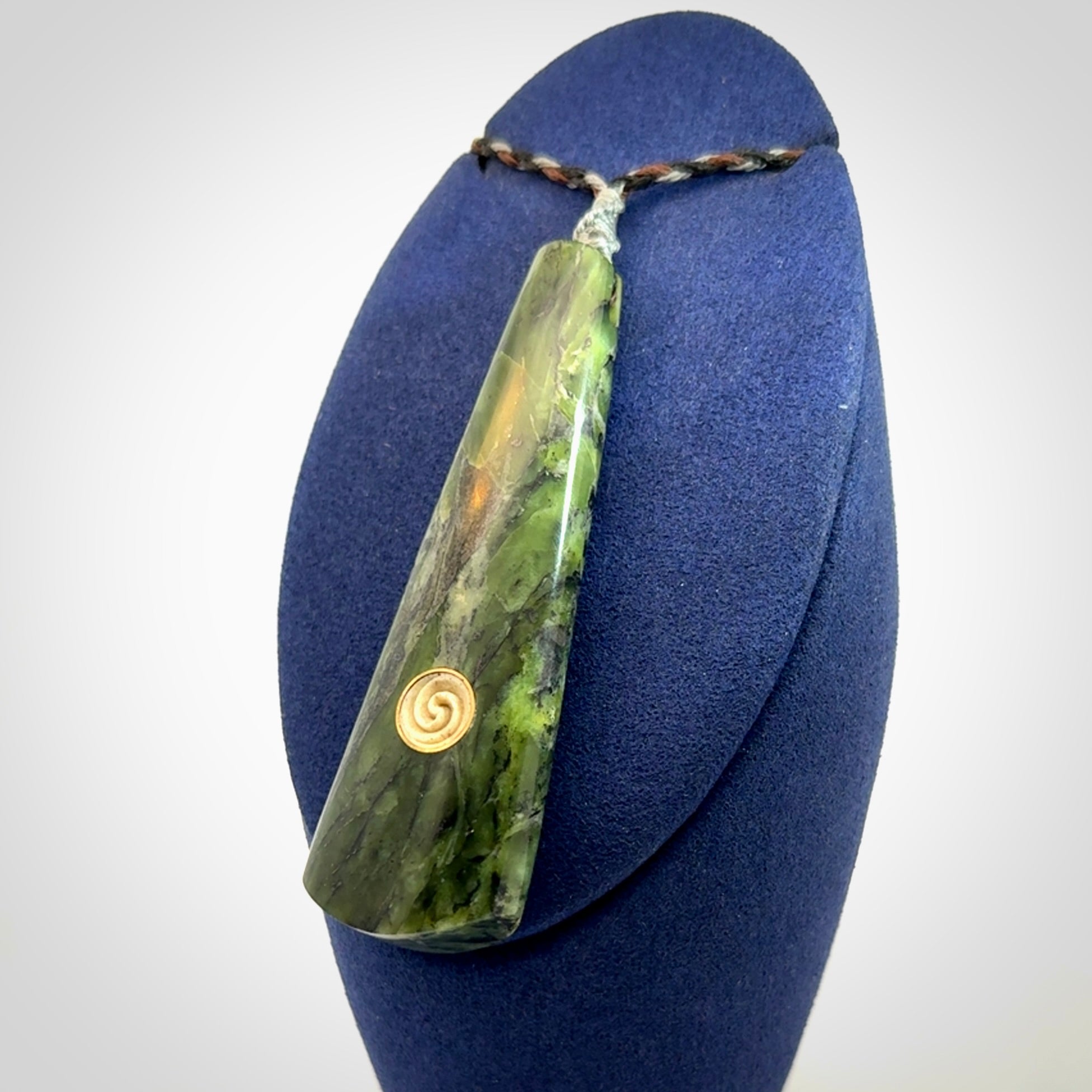 Hand carved New Zealand Jade drop pendant with whale bone koru inlay