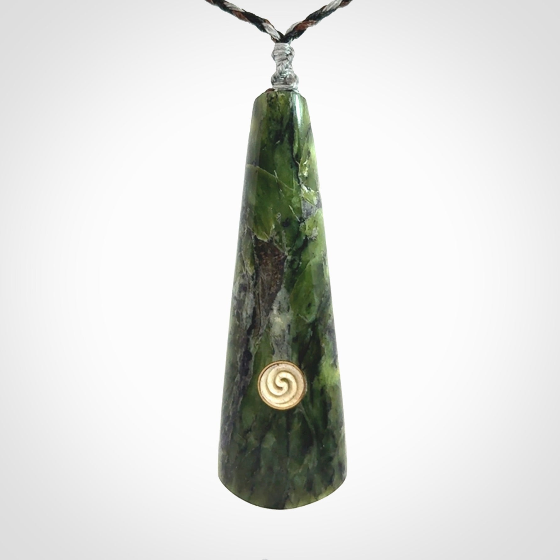 Hand carved New Zealand Jade drop pendant with whale bone koru inlay