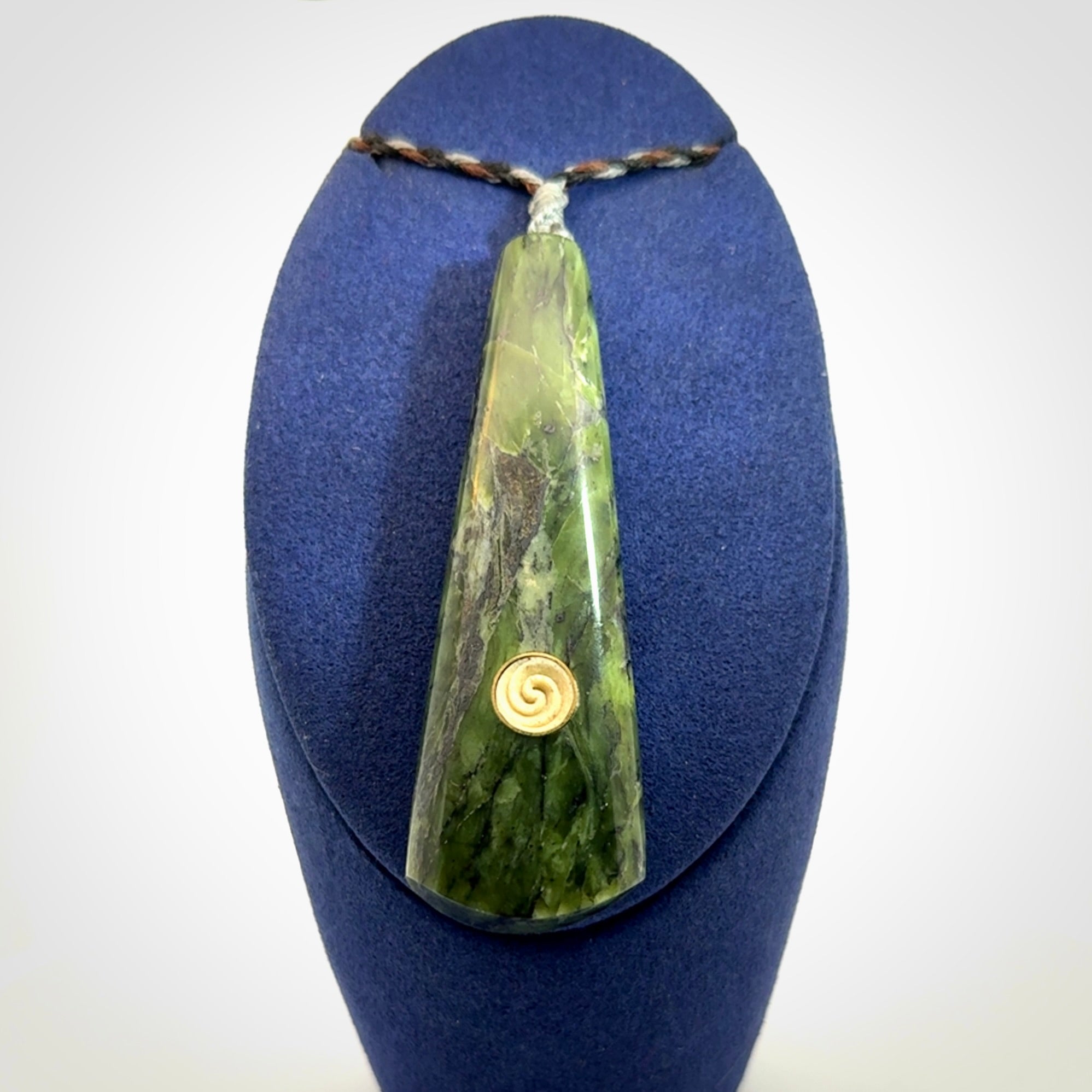 Hand carved New Zealand Jade drop pendant with whale bone koru inlay