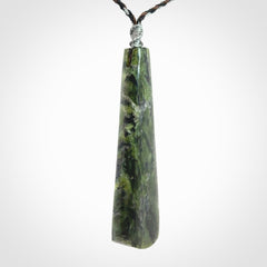 Hand carved New Zealand Jade drop pendant with whale bone koru inlay
