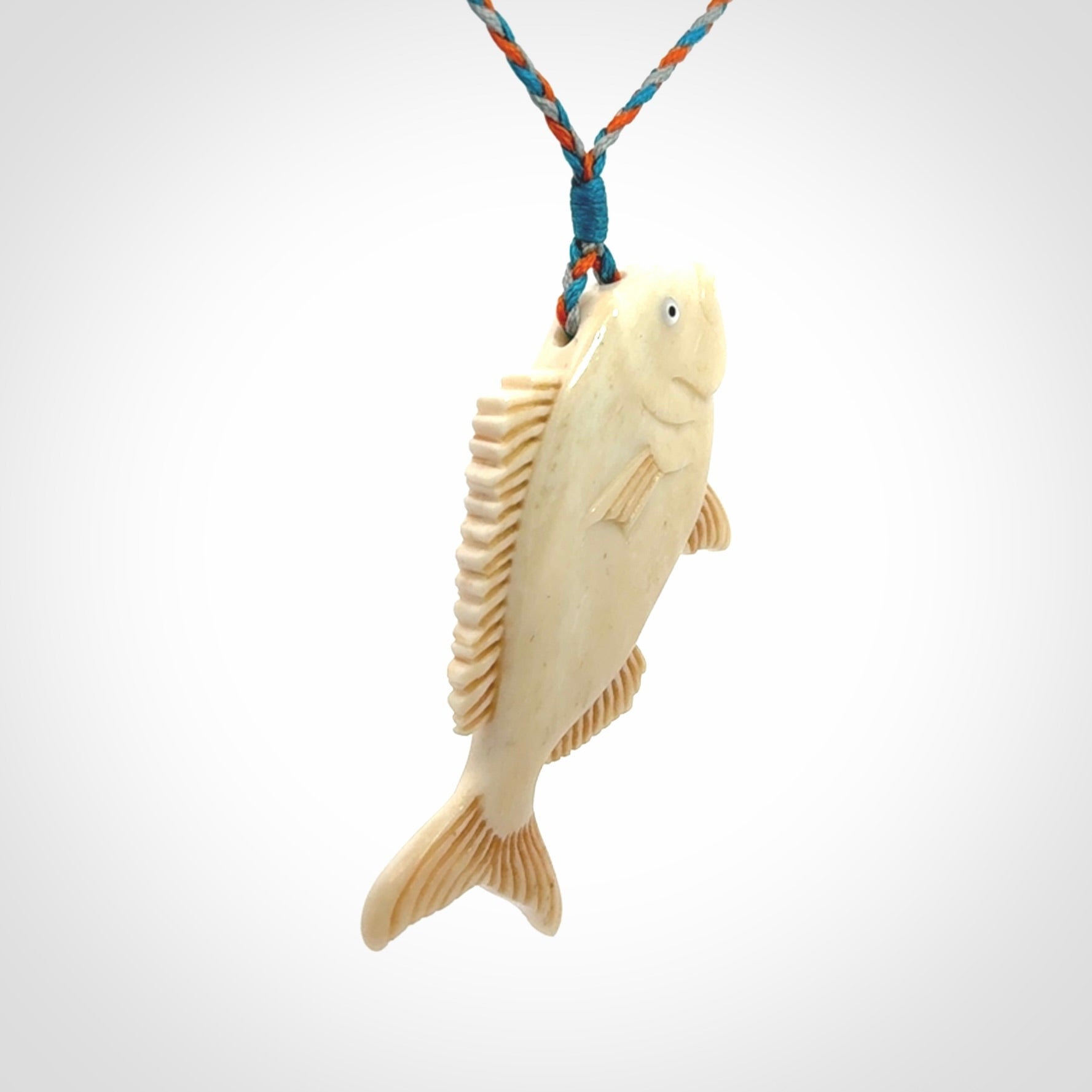 A Beautifully Carved Bone Snapper Pendant