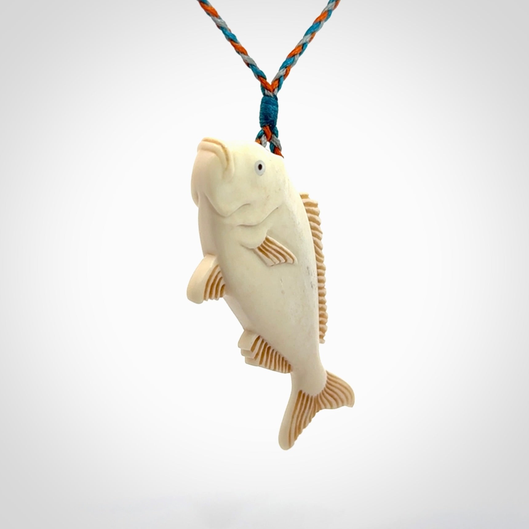 A Beautifully Carved Bone Snapper Pendant