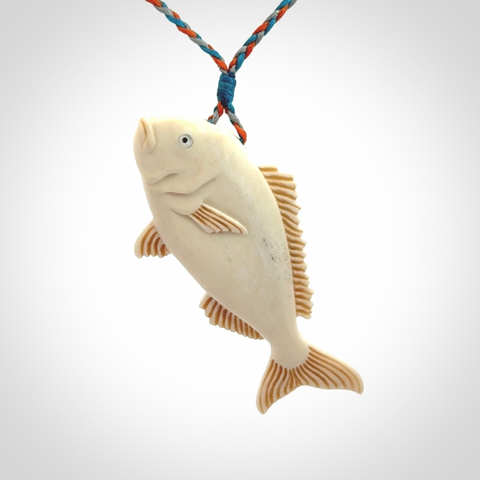 A Beautifully Carved Bone Snapper Pendant