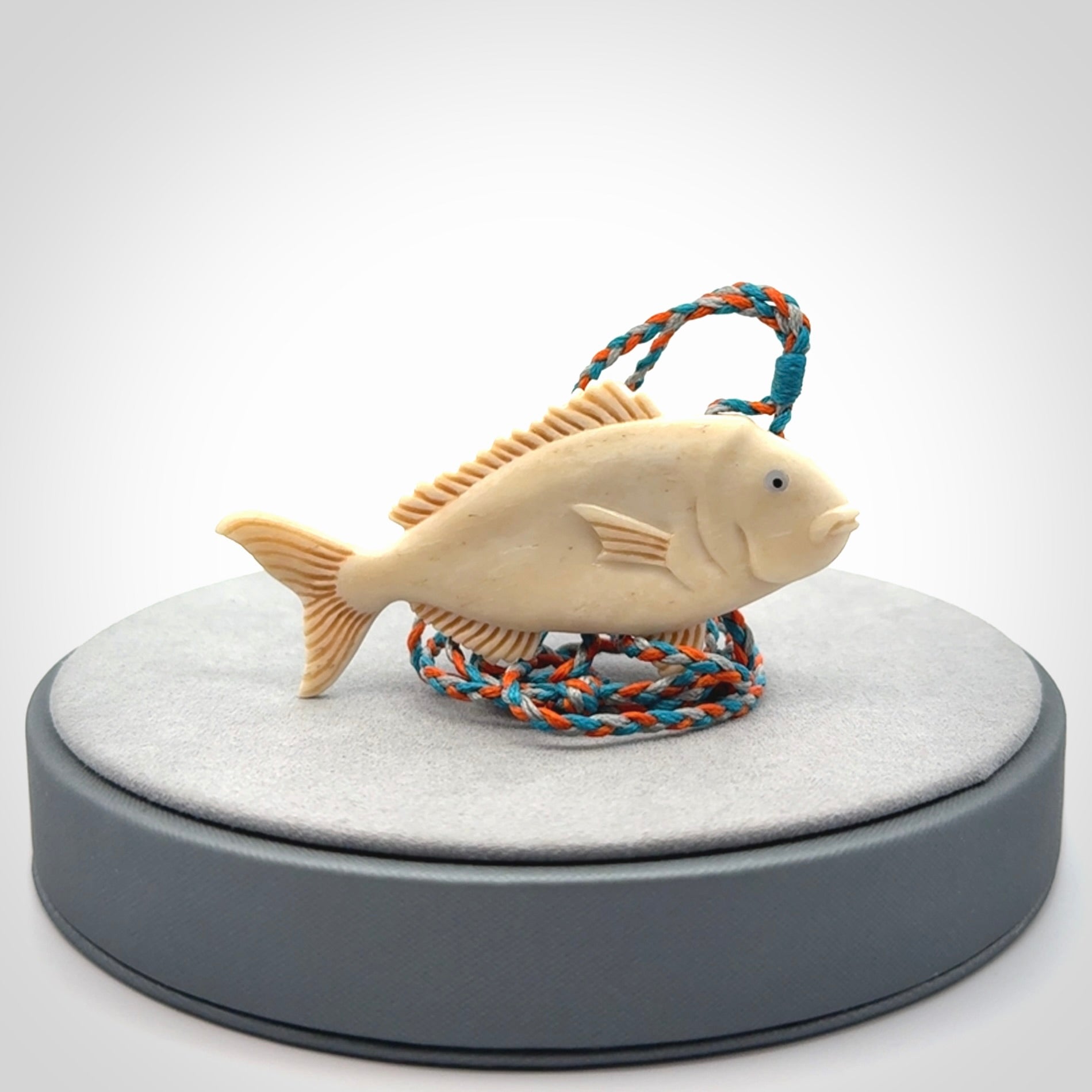 A Beautifully Carved Bone Snapper Pendant