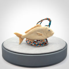 A Beautifully Carved Bone Snapper Pendant
