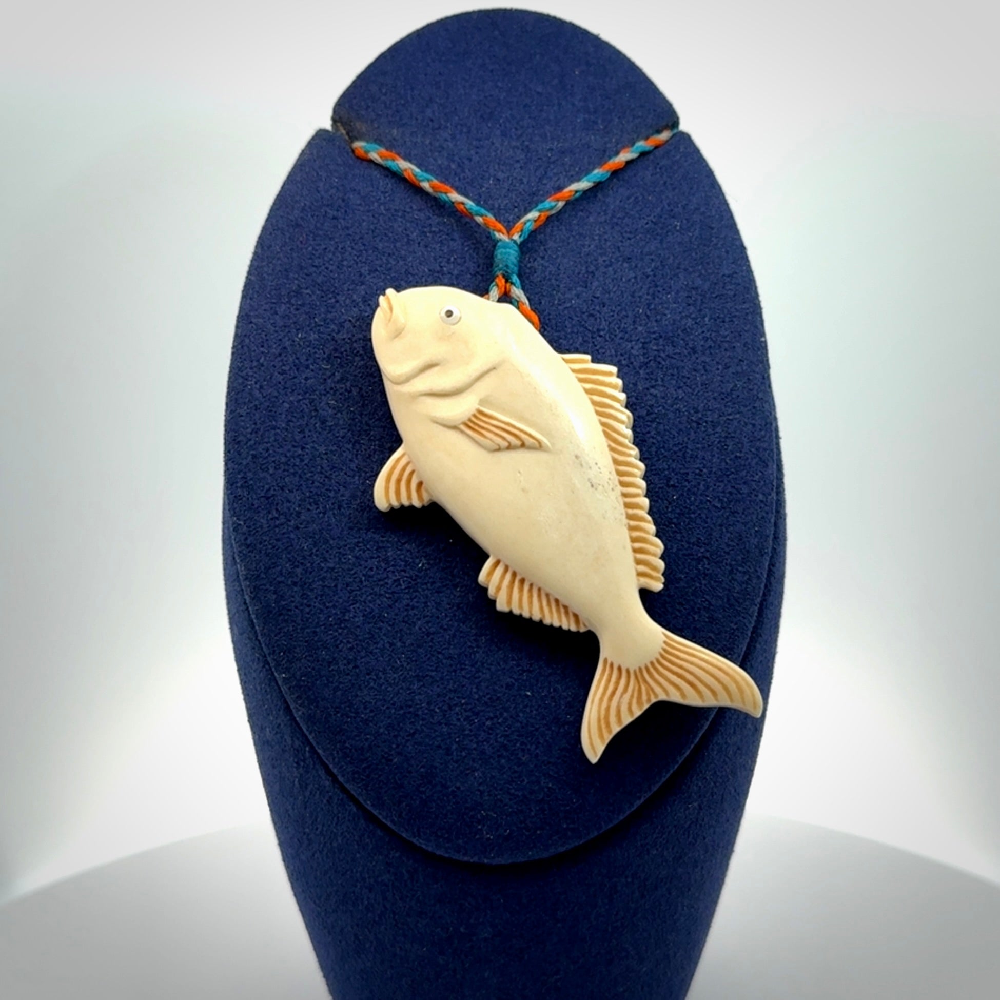 A Beautifully Carved Bone Snapper Pendant