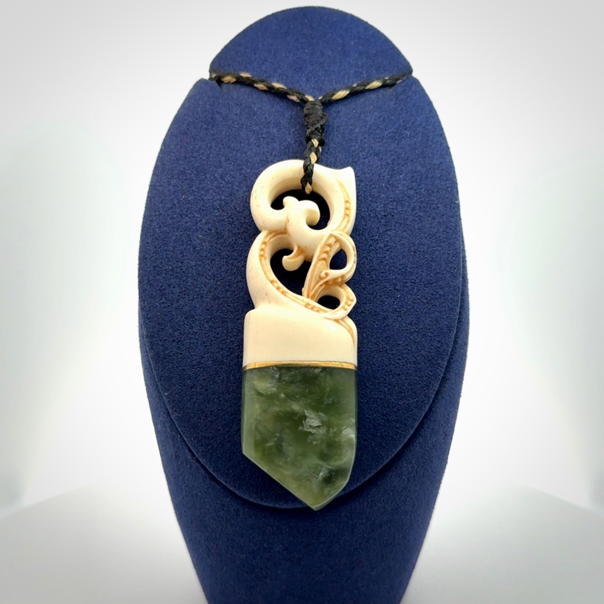 Hand carved Jade and bone pendant