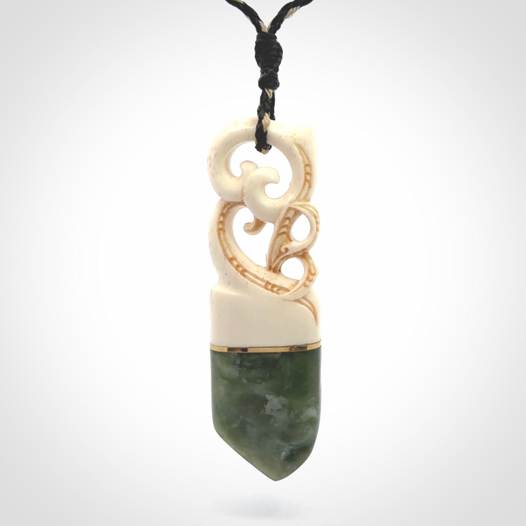 Hand carved Jade and bone pendant