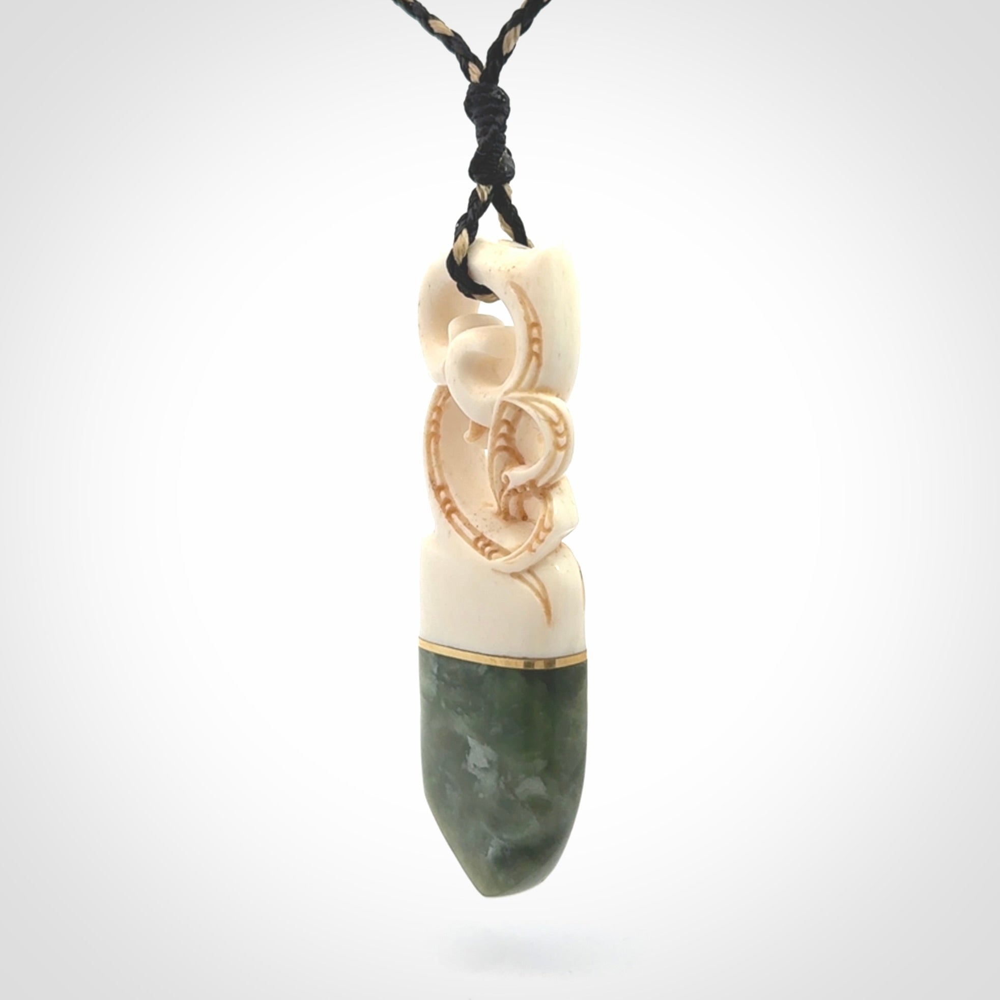 Hand carved Jade and bone pendant