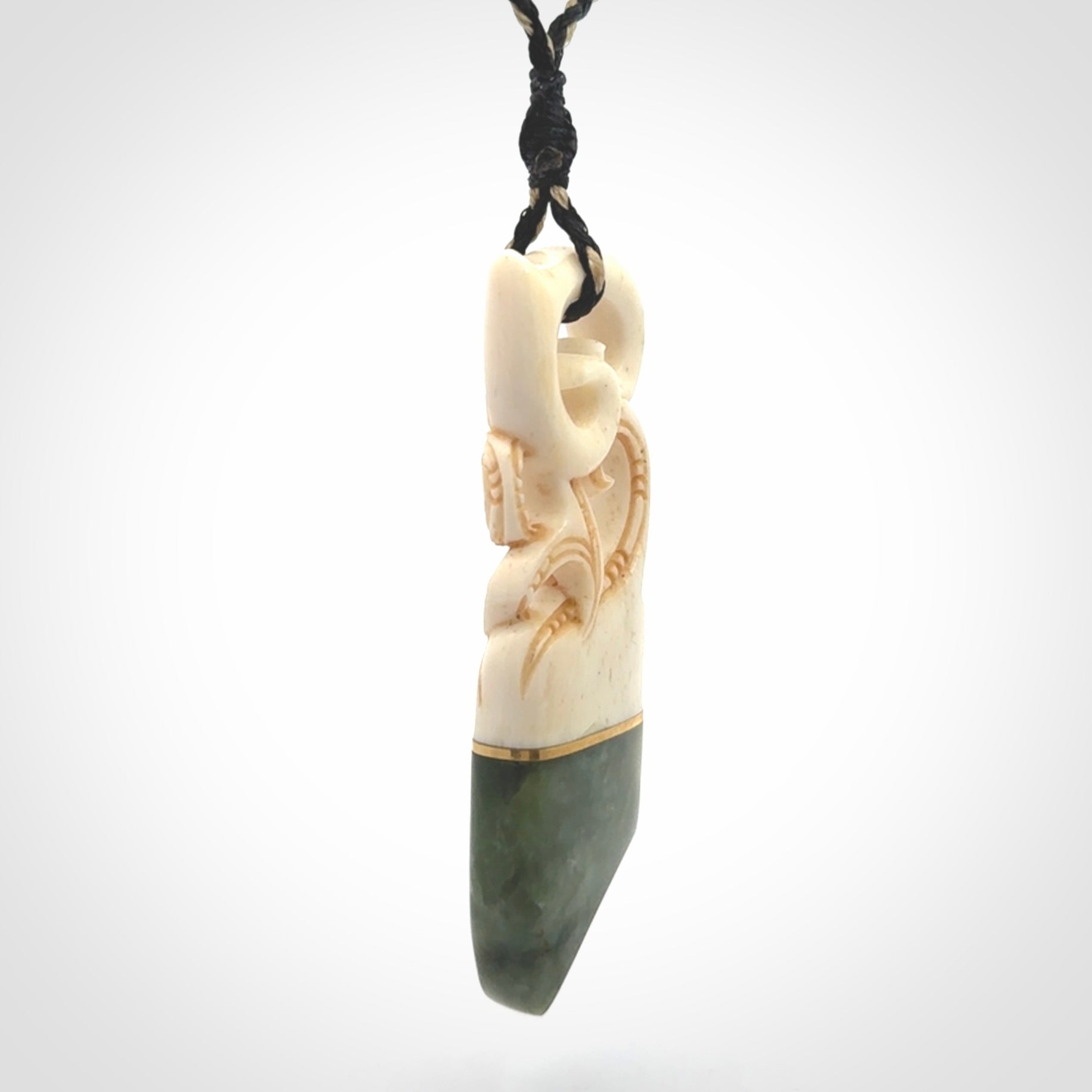 Hand carved Jade and bone pendant