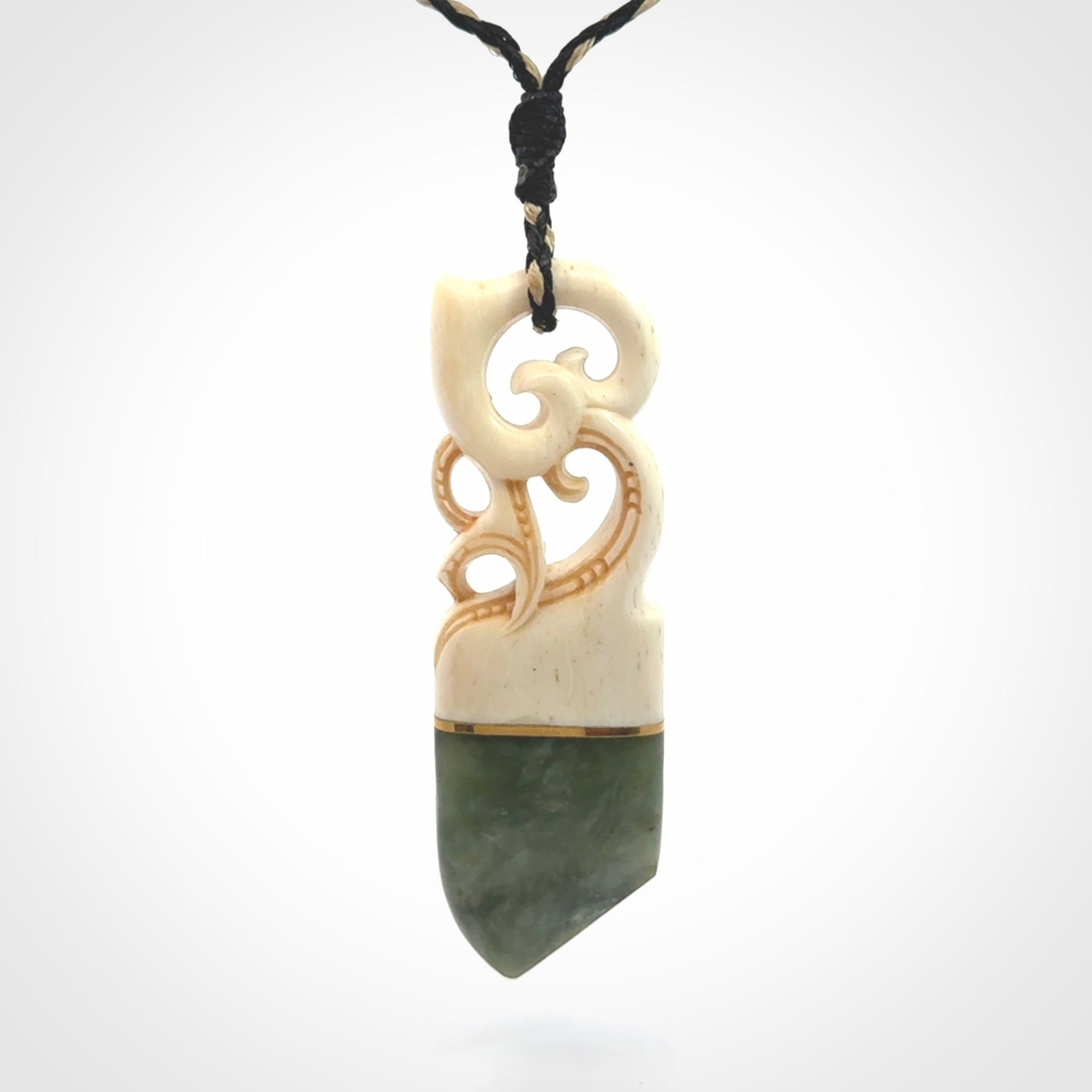 Hand carved Jade and bone pendant