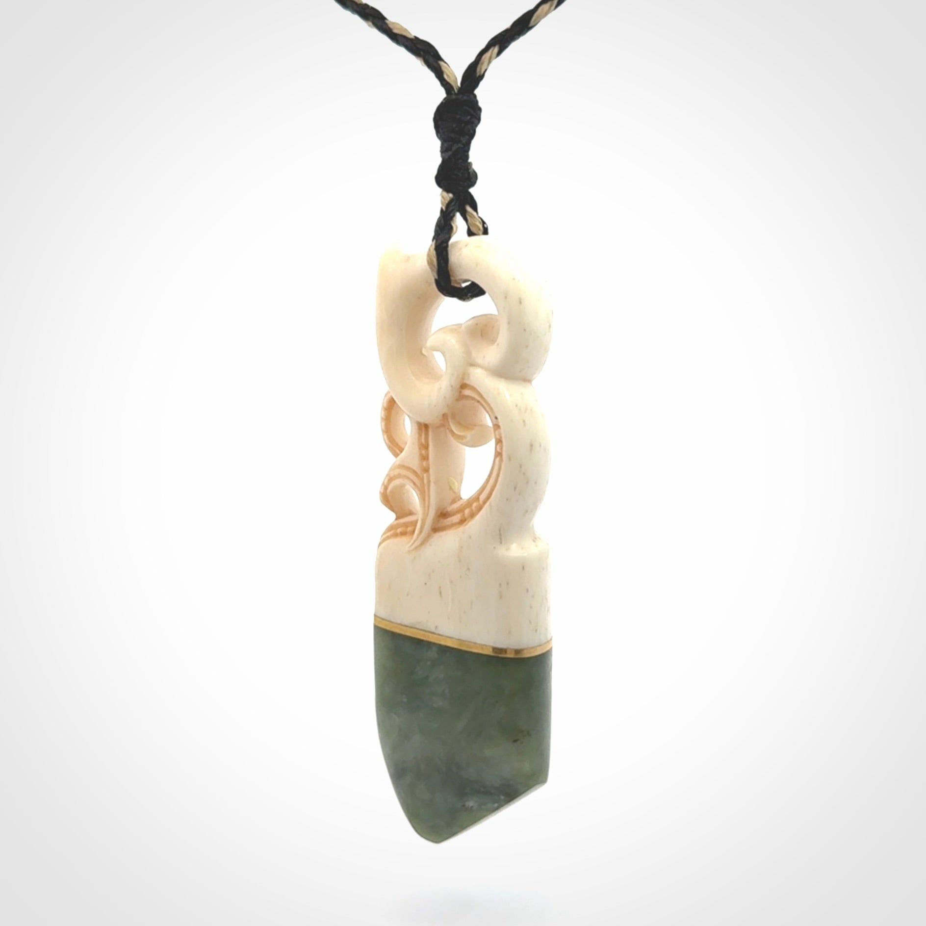 Hand carved Jade and bone pendant