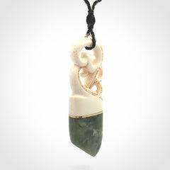 Hand carved Jade and bone pendant