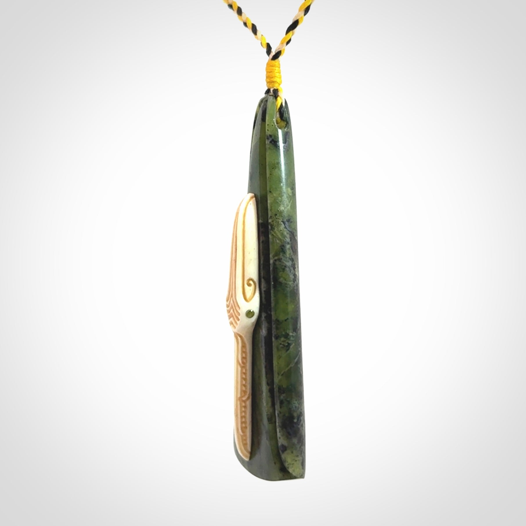 A Beautiful White Heron pendant, hand carved in Jade and Bone