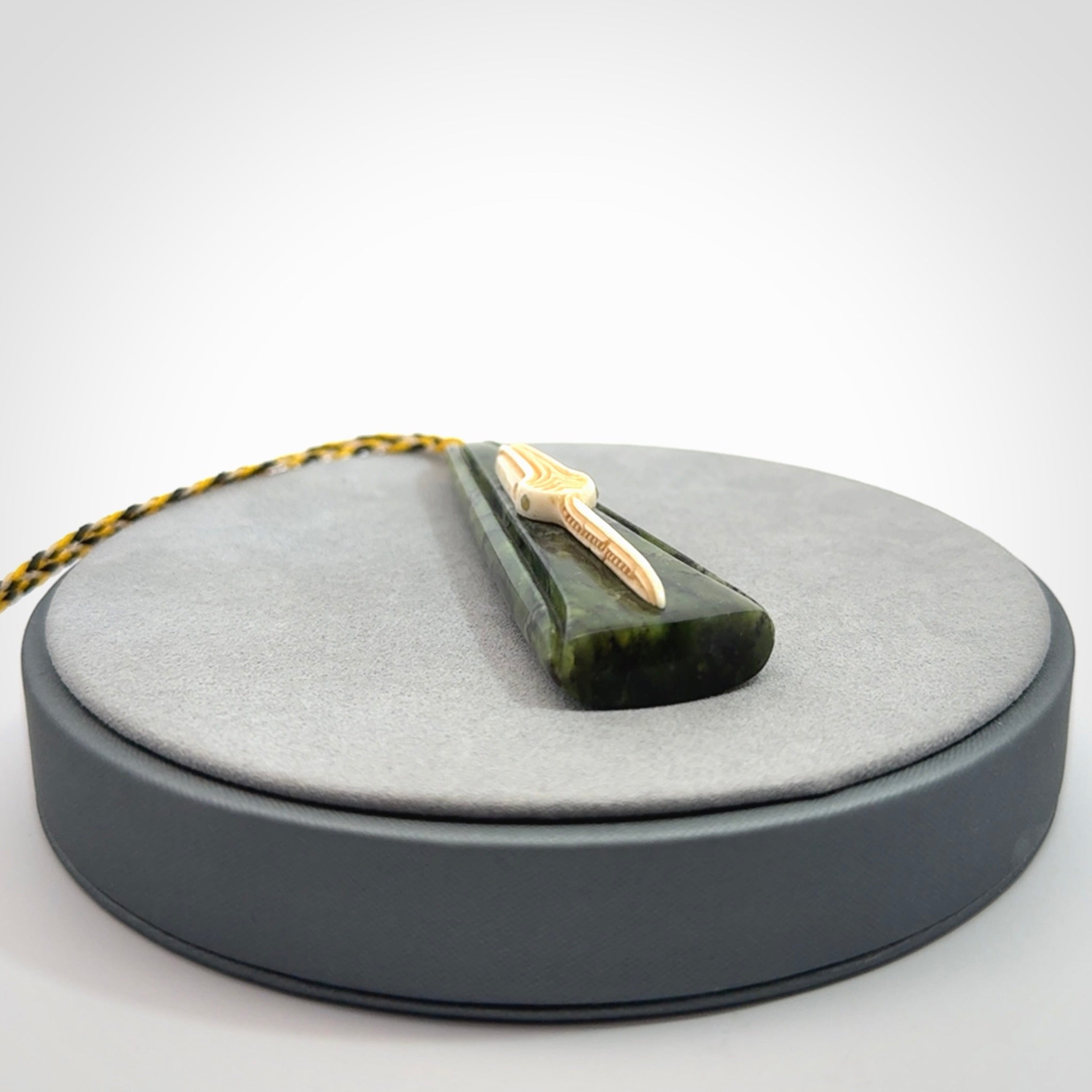 A Beautiful White Heron pendant, hand carved in Jade and Bone