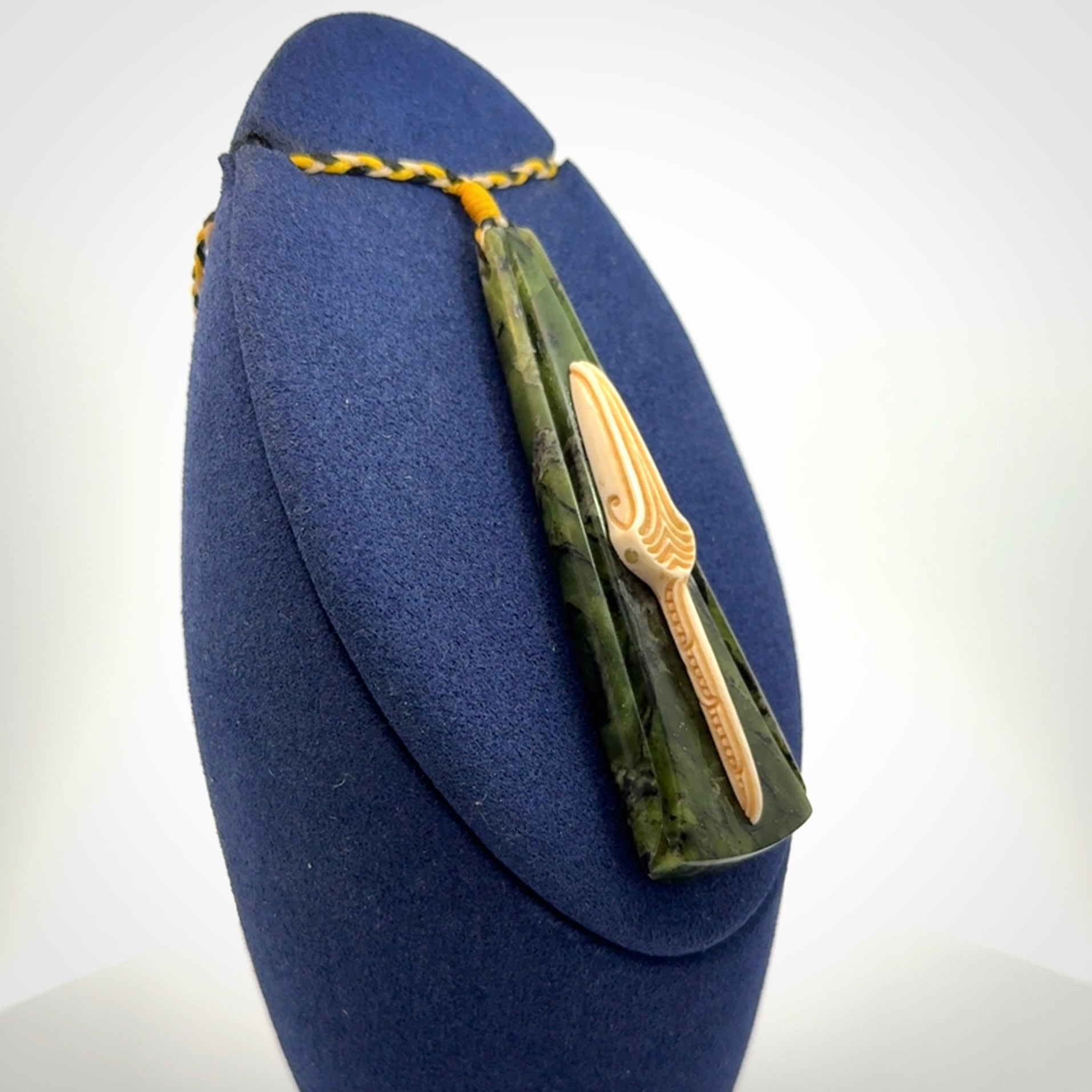 A Beautiful White Heron pendant, hand carved in Jade and Bone