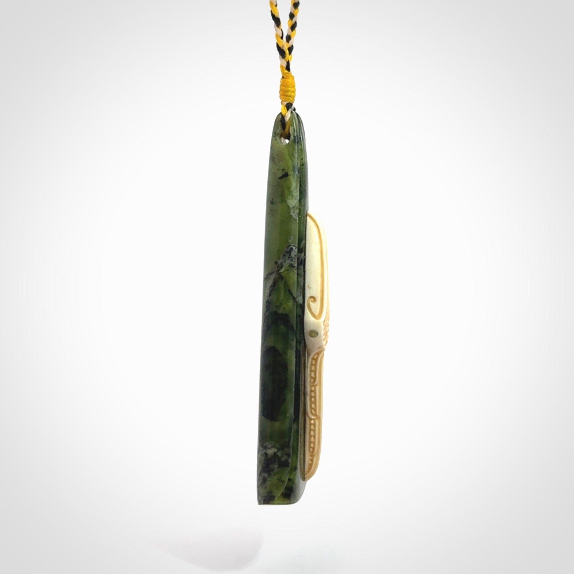 A Beautiful White Heron pendant, hand carved in Jade and Bone