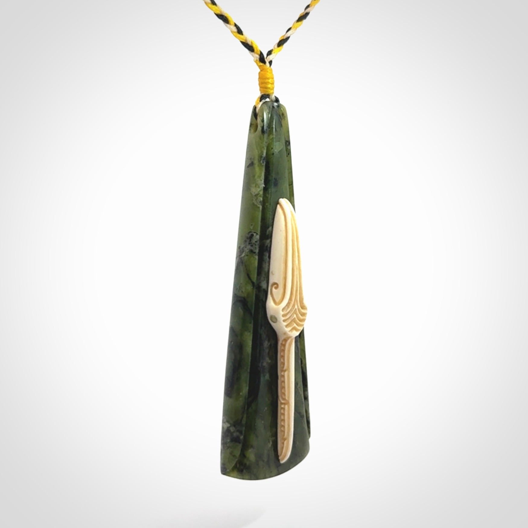 A Beautiful White Heron pendant, hand carved in Jade and Bone