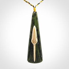 A Beautiful White Heron pendant, hand carved in Jade and Bone