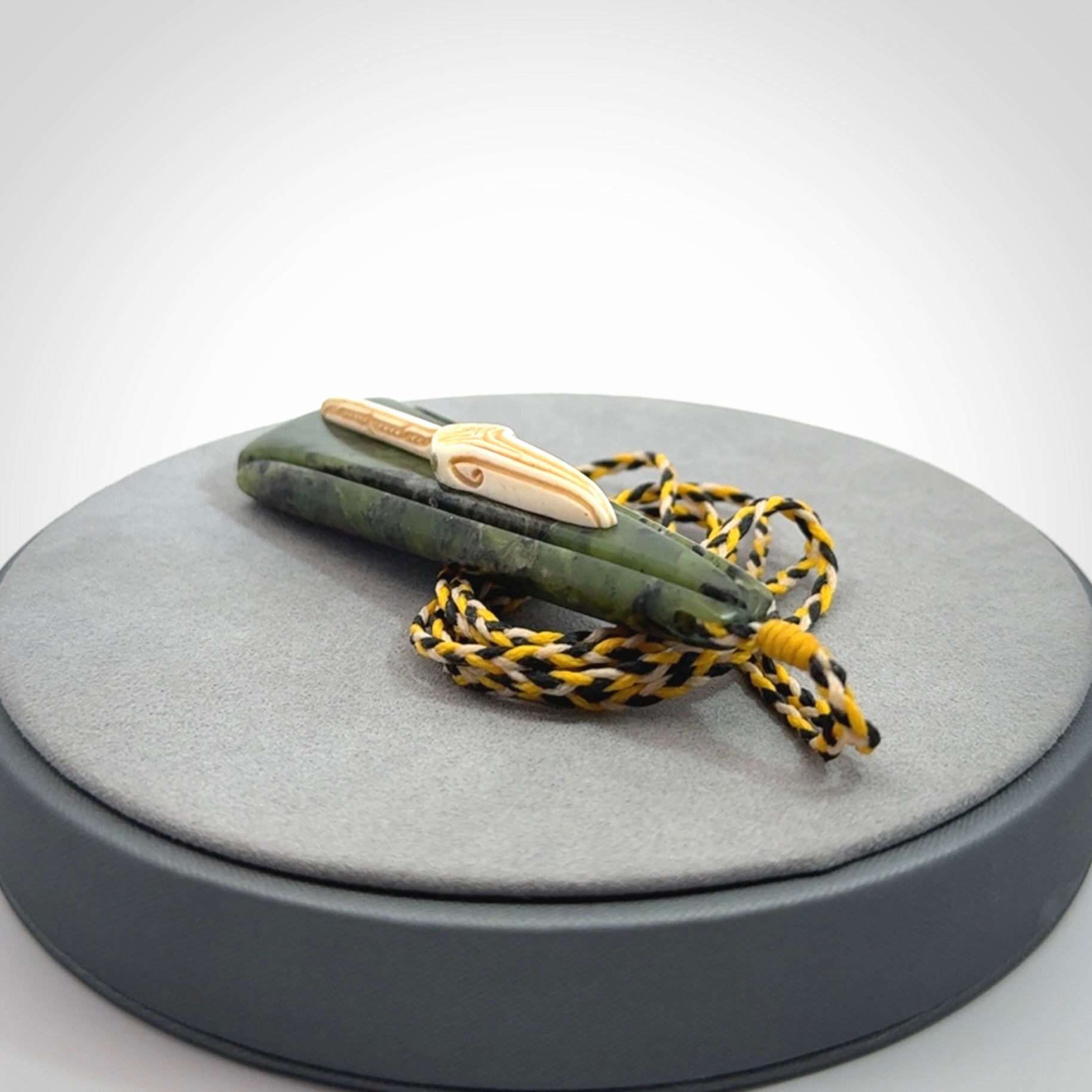 A Beautiful White Heron pendant, hand carved in Jade and Bone