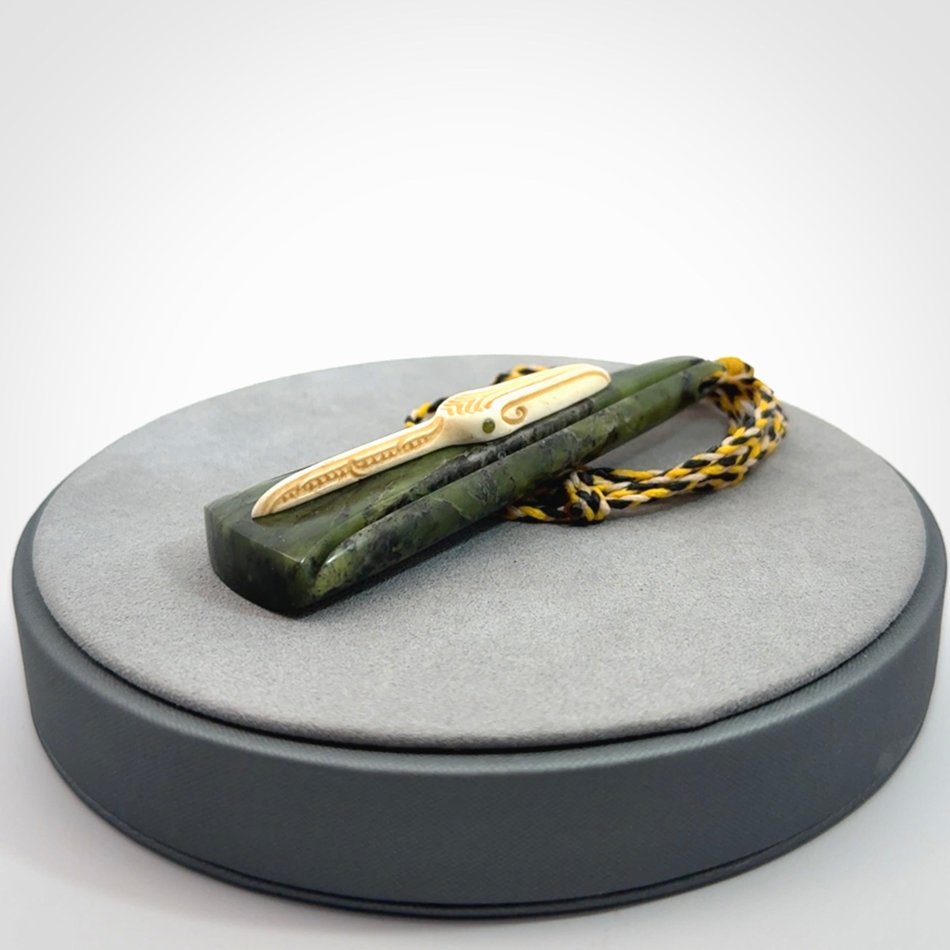 A Beautiful White Heron pendant, hand carved in Jade and Bone