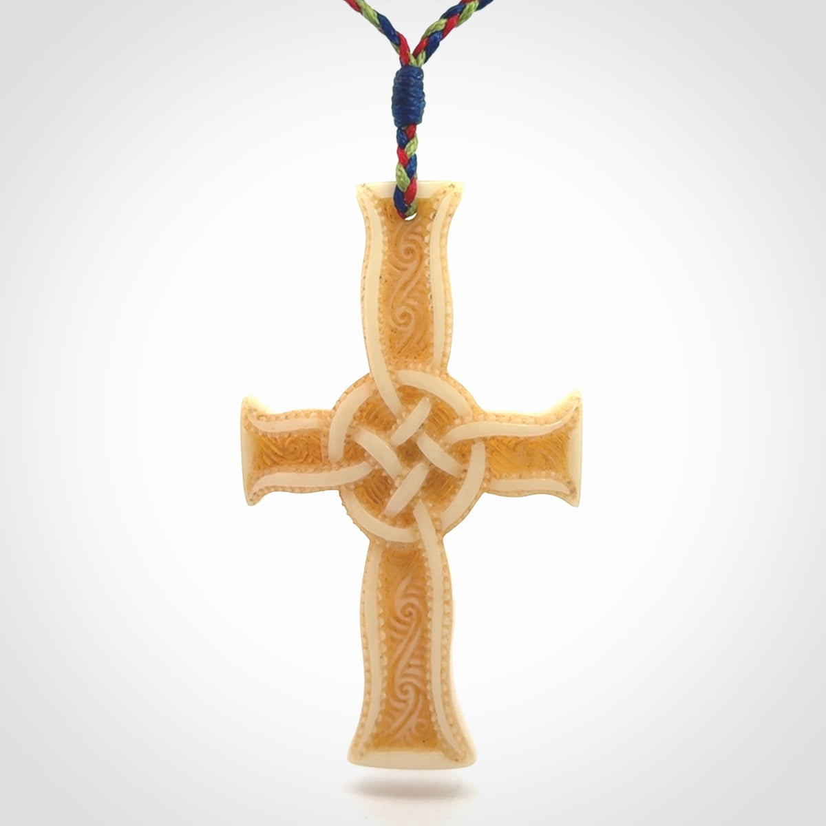 Hand carved bone Celtic cross pendant with jade inlay
