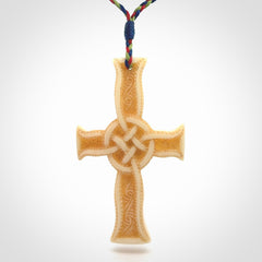 Hand carved bone Celtic cross pendant with jade inlay