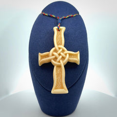 Hand carved bone Celtic cross pendant with jade inlay