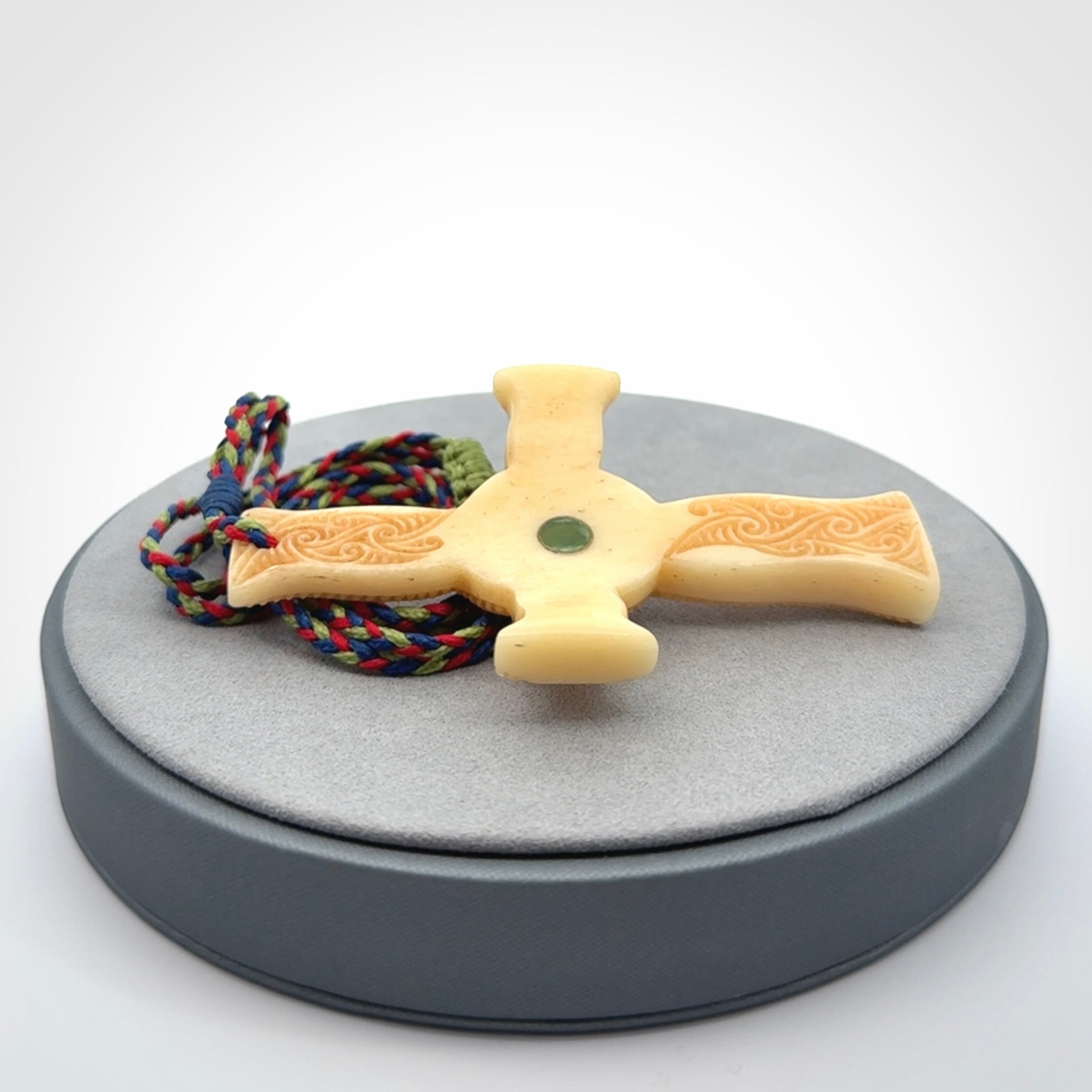 Hand carved bone Celtic cross pendant with jade inlay