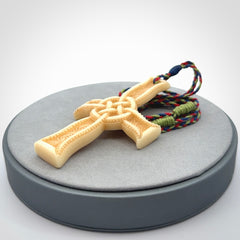 Hand carved bone Celtic cross pendant with jade inlay
