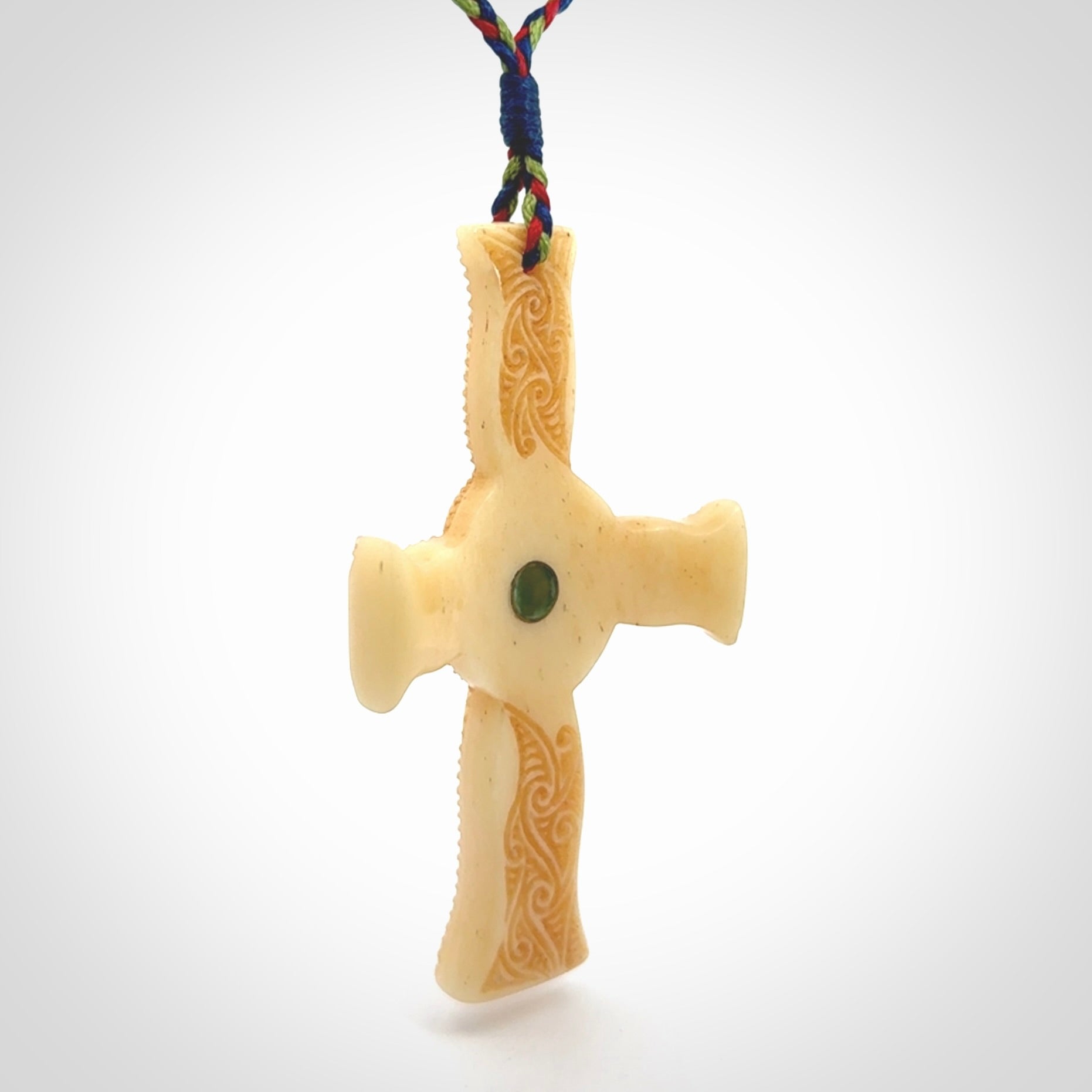 Hand carved bone Celtic cross pendant with jade inlay