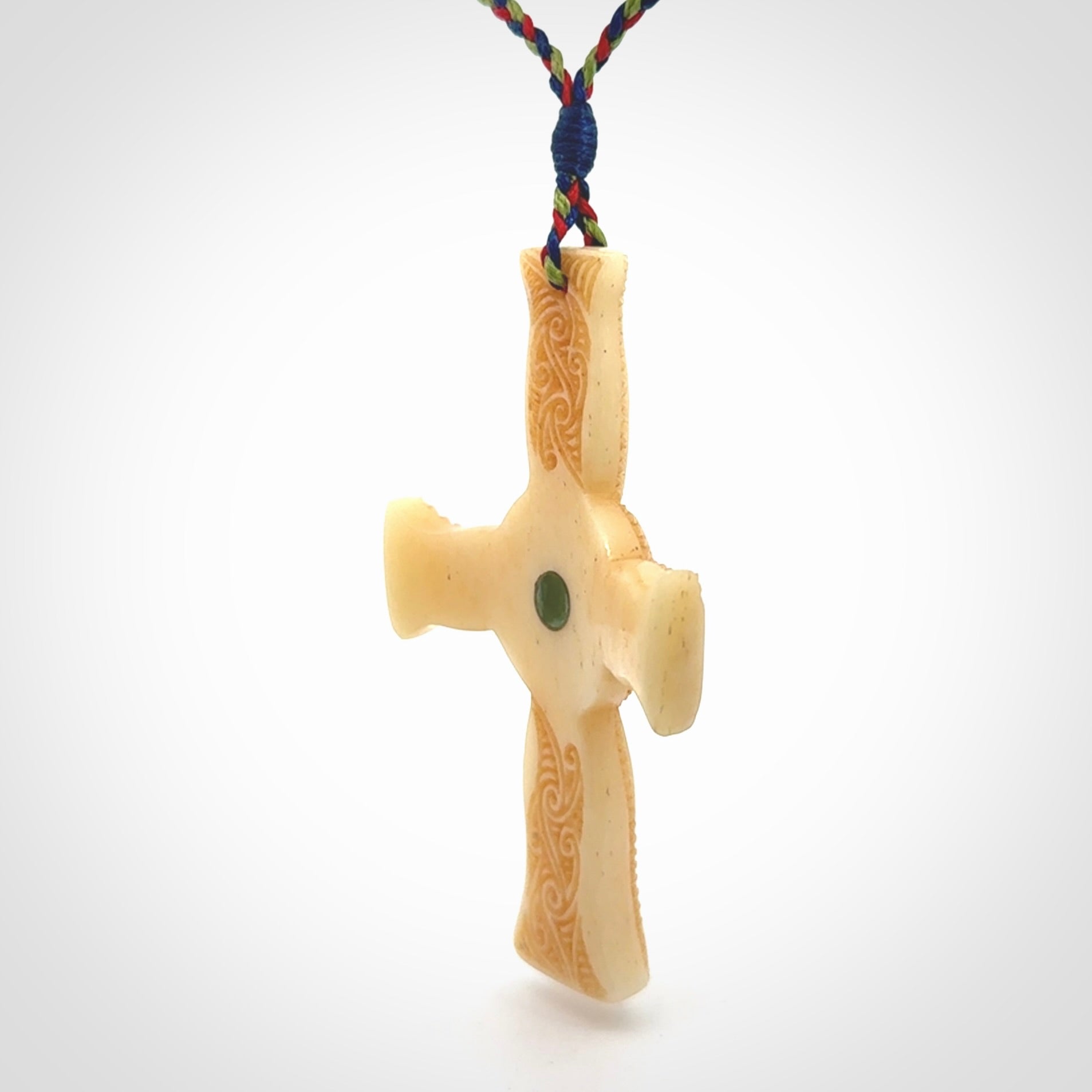Hand carved bone Celtic cross pendant with jade inlay