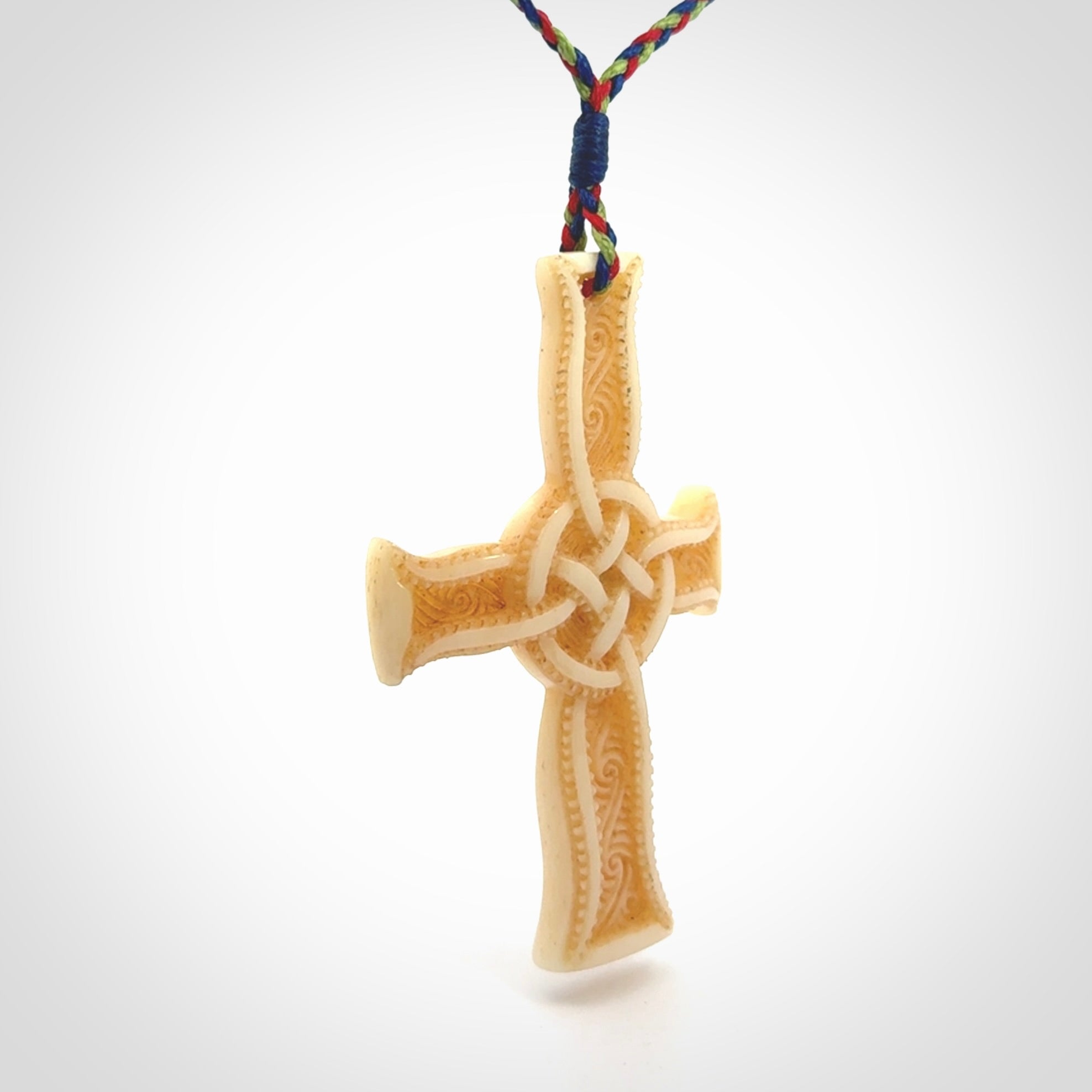 Hand carved bone Celtic cross pendant with jade inlay